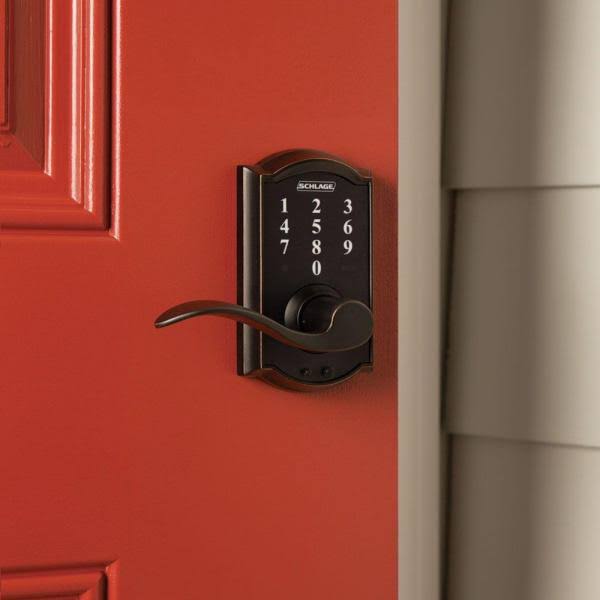 Aged Bronze Touch Entry Door Lever Set with Accent M676413